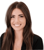 The image shows a smiling woman.